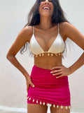 FALDA CORTA CONCHAS FUCSIA SF