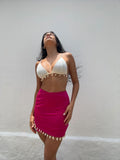 FALDA CORTA CONCHAS FUCSIA SF